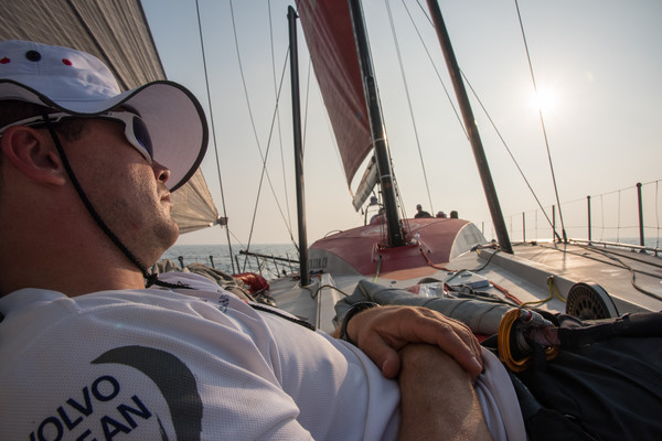 January 3, 2015. Leg 3 onboard Dongfeng Race Team; Bowman, Kevin Escoffier settles into a moment of light-air zen, which lasted about two minutes before he had to hoist the stay-sail.