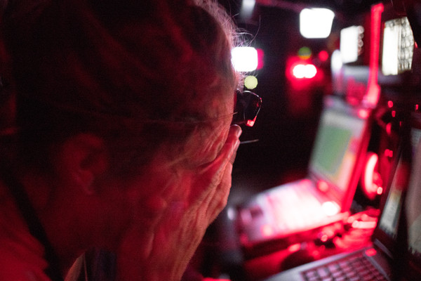 January 3, 2015. Leg 3 onboard Team SCA. Sam Davies rubs her face from exhaustion during the first night offshore in Leg 3.