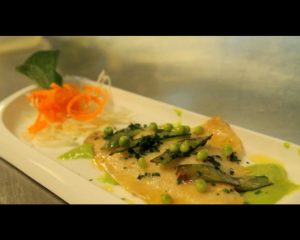 Il filetto orata e piselli, proposto dal ristorante la Bilaia